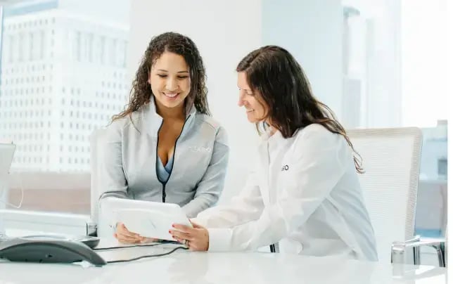 two-employees-reviewing-services